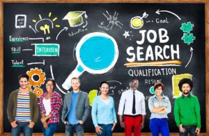 Job seekers in front of blackboard illustrations